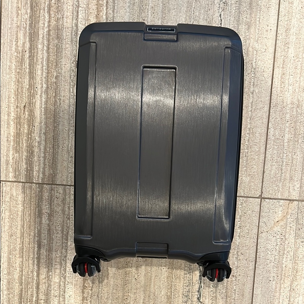 Samsonite Black Rolling Suitcase